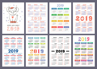 Calendar 2019. English colorful set. Week starts on Sunday. Pig. Cartoon piggy. Chinese horoscope. Happy New Year. Christmas card. Basic grid