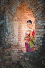 Asia woman in Thai dress traditional-Noppamas Queen Contest in Loy Kratong