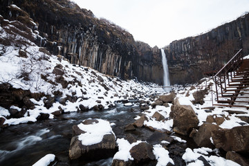 Skaftafell National Park view during winter snow which located in Vatnajokull Iceland that lead to Kristinartindar Mountain and Svartifoss waterfall.