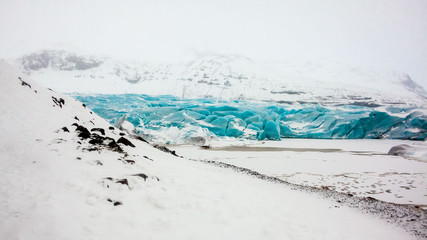 Svinafellsjokull glacier view during winter snow in Iceland