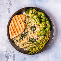Grilled chicken breast with brown rice, spinach, broccoli, asparagus