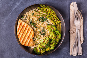 Grilled chicken breast with brown rice, spinach, broccoli, asparagus