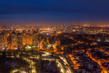Aerial photo from flying drone of a night Kiev city. Ukraine. 