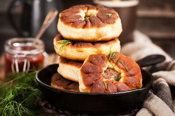 Traditional Russian deep fried meat patties (belyash)