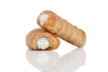 two cream filled cannoli