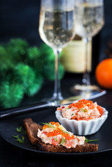 Salmon pate  with red caviar served with sliced bread