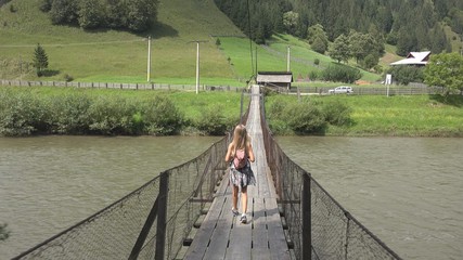 Child on Bridge in Mountains, Kid Hiking in Nature, Girl Looking a River, Stream