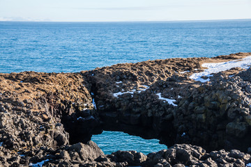 Arnarstapi or Stapi is a small fishing village at the foot of Mountain Stapafell between Hellnar village and Breidavik farms