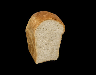 White bread loaf isolated on black background