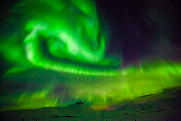 Aurora Borealis or better known as The Northern Lights for background view in Iceland, Snaefellsnesvegur during winter