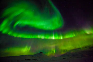 Aurora Borealis or better known as The Northern Lights for background view in Iceland, Snaefellsnesvegur during winter