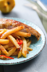 deep fried quince with red chili pepper and duck breast