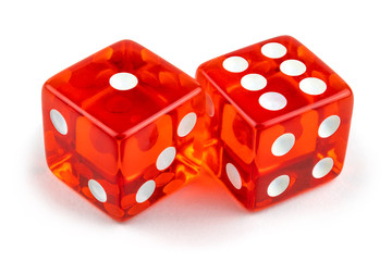 Two red glass dice isolated on white background. One and six