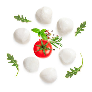 Mozzarella, arugula leaf and tomatoes  isolated  on white background. Top view