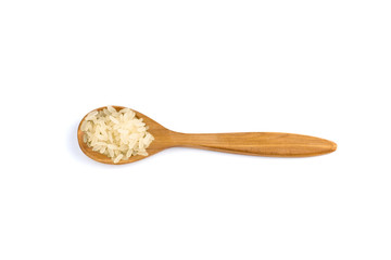 top view of a spoon of sandal wood with rice isolated on white background