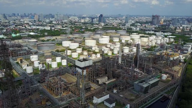 4K. Aerial view of oil and gas refinery or petroleum refinery. Plant factory of petrochemical industry and chemical manufacturing. Fuel and power resources. Shot from drone.