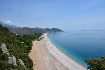 Cirali, Olympos, Antalya, TURKEY - Aerial view of Cirali Beach from ancient Olympos ruins located located on historical Lycian way.