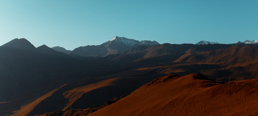 Panoramic picturesque Dawn In The Mountains Of The Elbrus Region. North Caucasus, Russia