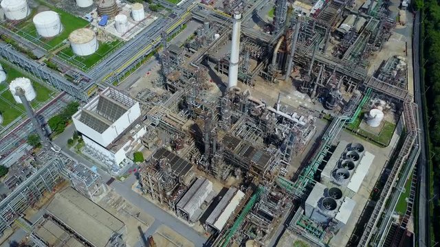 4K. Aerial view of oil and gas refinery or petroleum refinery. Plant factory of petrochemical industry and chemical manufacturing. Fuel and power resources. Shot from drone.