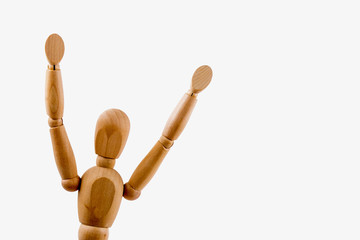 Wooden dummy holds two hands in air on white background isolated