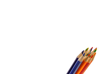 Fototapeta premium Colored pencils arranged in a group isolated on white background