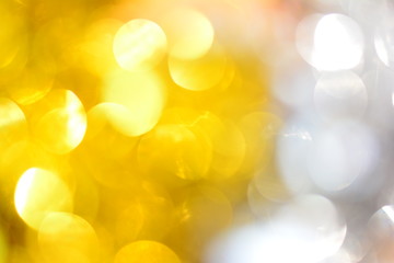 Color gold and white bokeh for background,For Christmas and Happy new year.