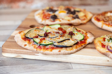 Close up of a pizza with vegetables