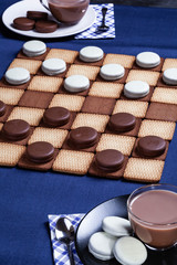 Cookie's checkers and two cups of coffee