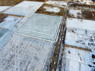 Aerial view of the countryside with the first snow (drone image). Near Kiev,Ukraine