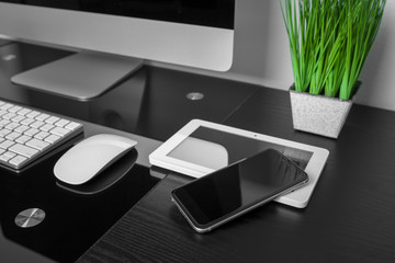 computer on a table in an office