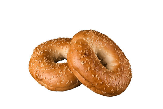 Close up on a set of bagel with sesame seeds. Isolated on white background.