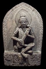 Ancient statue of Narada - heavenly musician in hindu temple in Patan, Kathmandu Valley, Nepal