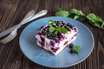 Delicious homemade cottage cheese casserole with berries on a plate