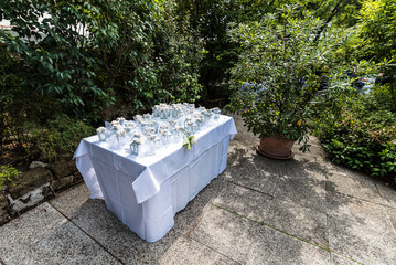 Fototapeta na wymiar Wedding favors on the table during wedding party