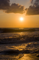 Amazing sea sunset, the sun, waves, clouds
