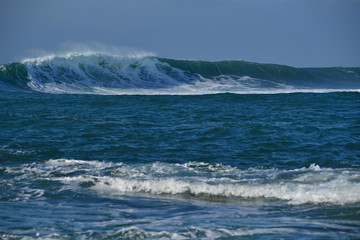 Fototapeta premium Ocean wave, Jersey, U.K. Telephoto image of the ocean in Autumn.
