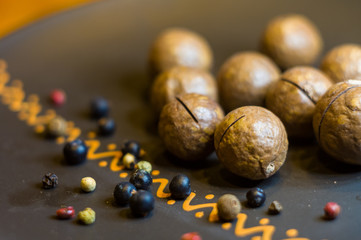 macadamia, Australian nut in a ceramic plate