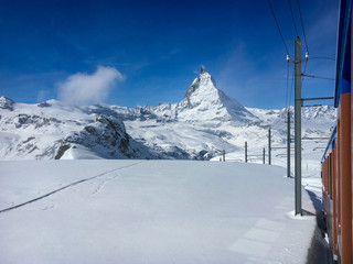Matterhorn mountain and alpine landscape with Gornergrat railway (Gornergratbahn) .