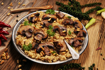 risotto with mushrooms, fresh herbs and parmesan cheese