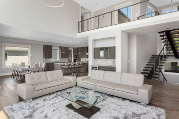 Living Room, Dining Room, and Kitchen in New Luxury Home with Open Concept Floor Plan
