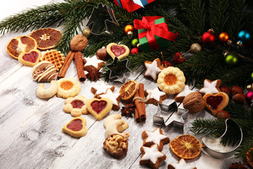 Baking christmas cookies. Typical cinnamon stars bakery for xmas with ingredients.