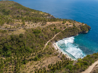 Fototapeta na wymiar Aerial view to ocean cape at Atuh beach on Nusa Penida island, Indonesia
