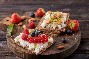 Sandwich with nuts and berrie Useful breakfast.