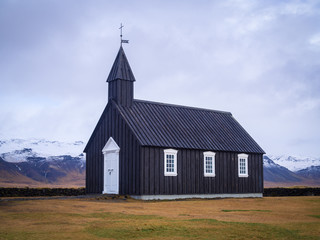 Fototapeta na wymiar Black wooden church near Budir, Iceland