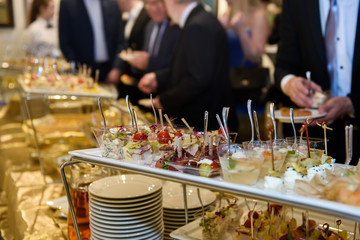 Furshet at the reception. Cold appetizer on the buffet table to drink for campaign at the party.