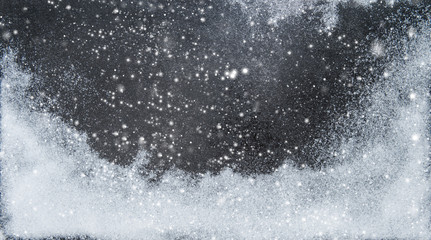 Naklejka na ściany i meble Winter background White falling snow dark