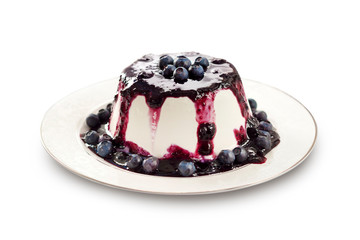 Sweet pudding with blueberry confiture