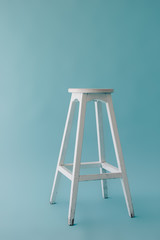 White chair on blue