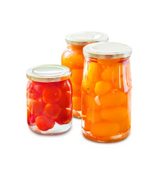 Fototapeta na wymiar Glass jars with homemade pickled tomatoes, sealed with metal lid