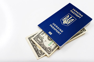 Ukrainian passport on a world map on a white background, background and texture.